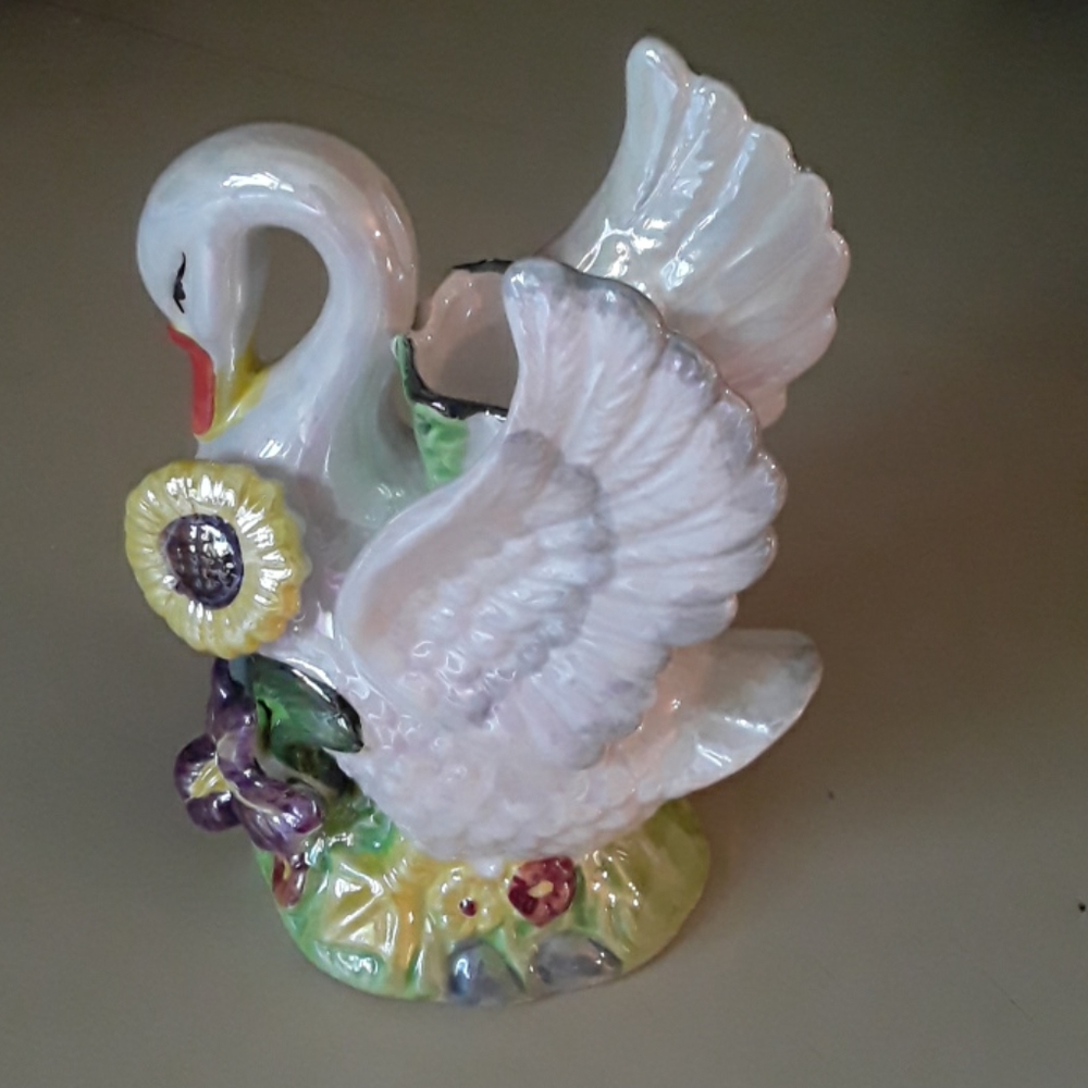 Painted white swan statue
